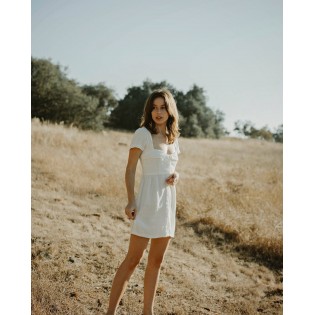 White linen short dress with tie back